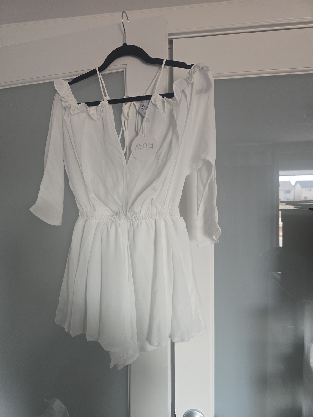 Xenia Boutique White Off-Shoulder Romper with Ruffle Trim